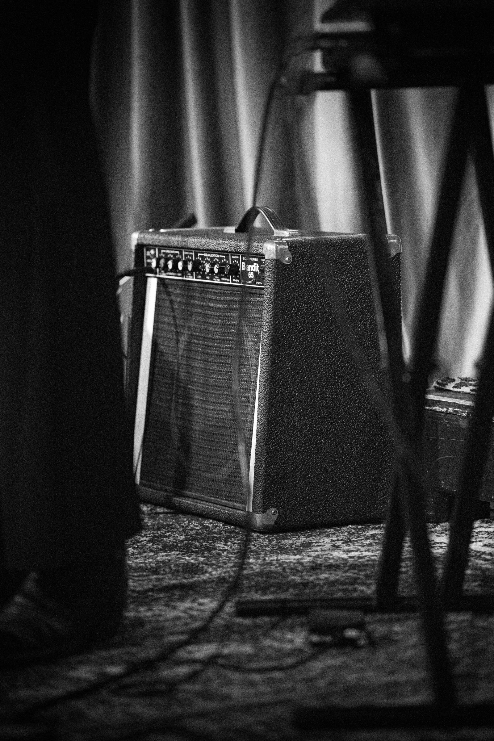 A guitar amplifier cabinet, close up and slightly worn
