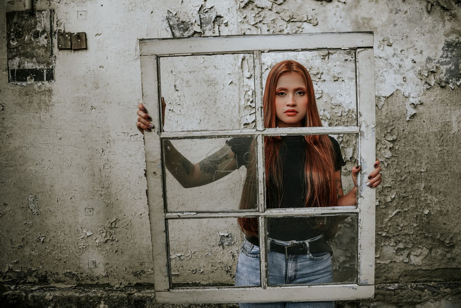 Dark, moody portrait evoking the enduring grunge aesthetic