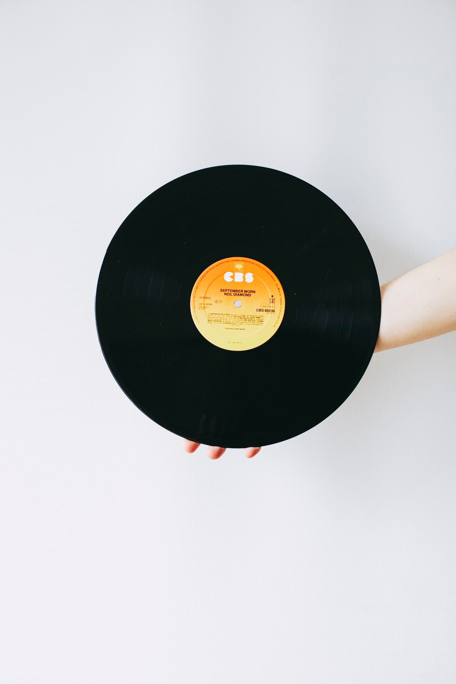 A vinyl record on a turntable, referencing Pearl Jam's debut album Ten